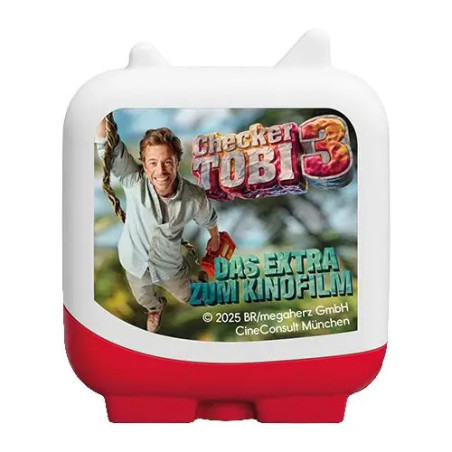 Kleine, weiß-rote Spielzeugkapsel mit Checker-Tobi-Film-Motiv und deutschem Text auf der Vorderseite.