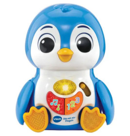 Blau-weißer Spielzeugpinguin mit orangen Füßen und Tasten mit Noten und Zahlen auf dem Bauch.