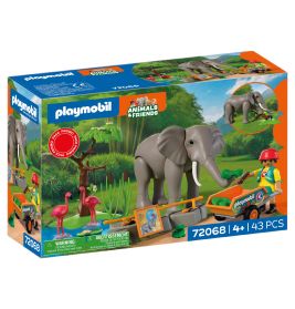 Playmobil Tiere & Freunde Set: Elefant, zwei Flamingos, eine Figur und ein Wagen in einer Dschungelszene.