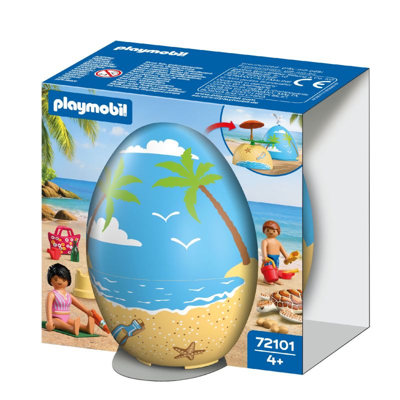 Playmobil-Strandspielset in ei-förmiger blauer Box mit Palmen- und Sandmotiv.