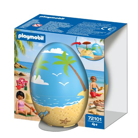Playmobil-Strandspielset in ei-förmiger blauer Box mit Palmen- und Sandmotiv.