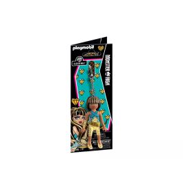 Playmobil Monster High Puppe im goldenen Outfit, mit Zubehör und farbenfroher Verpackung.