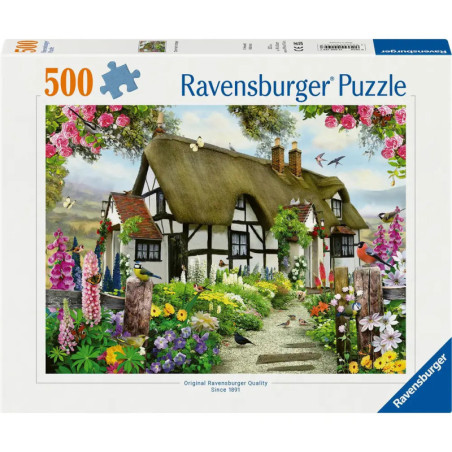 500-teiliges Ravensburger Puzzle mit Motiv: Reetgedecktes Cottage, umgeben von bunten Blumen und viel Grün.