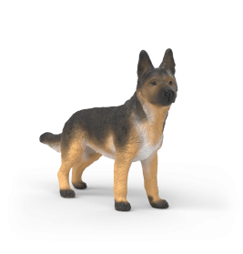 Plastikfigur eines Deutschen Schäferhundes steht auf weißem Hintergrund.