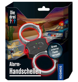 Box der Spielzeug-Alarm-Handschellen mit Sirene, Polizeiauto und Wüstenhintergrund abgebildet.