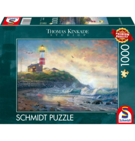 Puzzlebox mit Motiv: Leuchtturm an felsiger Küste bei Sonnenuntergang, Wellen, Vögel und ein nahes Haus.