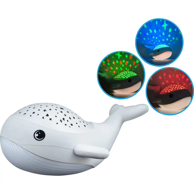 Weißes Walfisch-Nachtlicht mit sternförmigen Aussparungen projiziert blaue, grüne und rote Sterne.