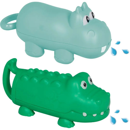 Zwei Kunststofftiere, ein blaues Nilpferd und ein grünes Krokodil, spritzen Wasser aus ihren Mündern.