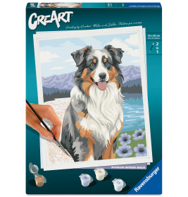 Malset-Box mit Bild eines Australian Shepherds vor Bergen und Blumen im Hintergrund.