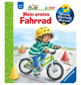 Ein Kind mit Helm fährt auf dem Buchcover ein grünes Fahrrad um Verkehrskegel.