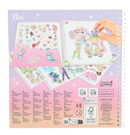 Spiralgebundenes Kunstset mit Stickern, Fantasietieren und Pastellzeichnungen auf lila-pinkem Hintergrund.