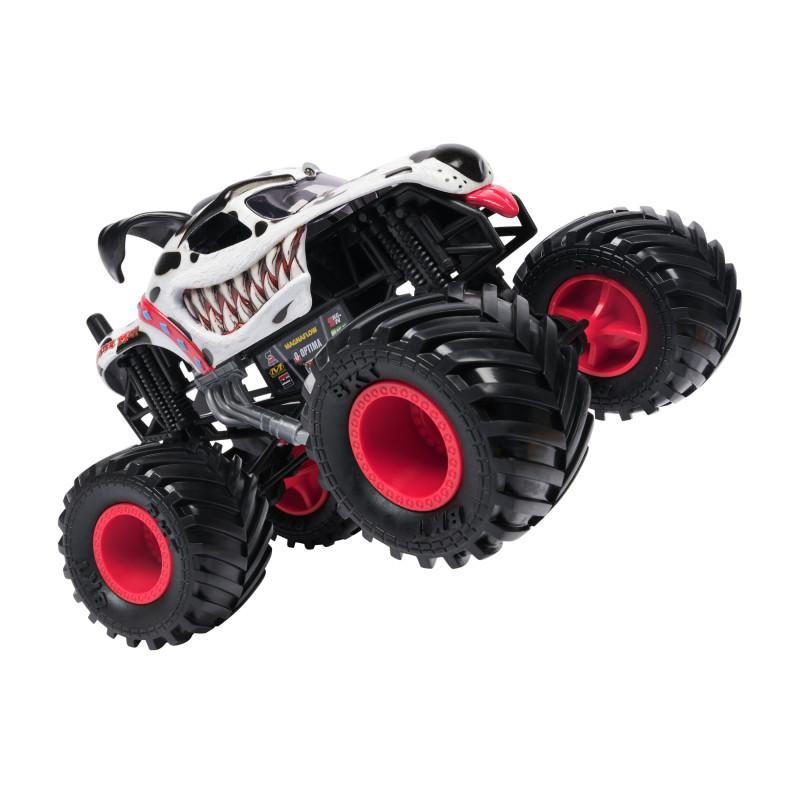 Spielzeug-Monstertruck mit großen schwarzen Reifen, roten Felgen und Hai-Zähnen auf der Karosserie.
