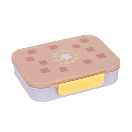 Pastellfarbene Brotdose mit rosa Deckel, gelbem Verschluss und dem Aufdruck "Let your light shine bright" obenauf.