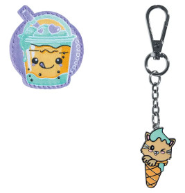 Ein lächelnder Boba-Patch und ein Schlüsselanhänger mit Katze im Eishörnchen, grüne Haare.