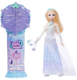 Elsa-Puppe aus Frozen mit einer blau-lila, juwelthematisierten Überraschungsverpackung daneben.