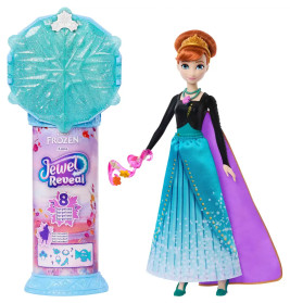 Frozen Jewel Reveal Anna Puppe steht neben einem dekorativen Behälter mit blauen, violetten und pinken Akzenten.