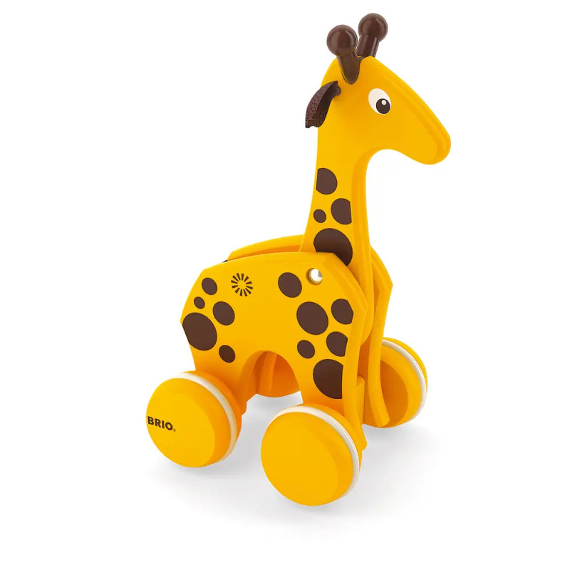 Gelbe Spielzeug-Giraffe mit braunen Flecken und Rollen statt Füßen, für Kleinkinder zum Schieben oder Ziehen.