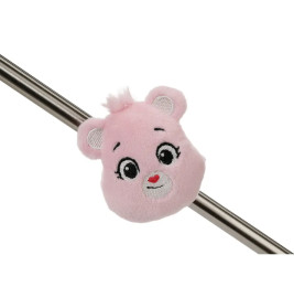 Ein rosafarbener Plüsch-Bärenkopf mit lächelndem Gesicht ist an einer Metallstange befestigt.