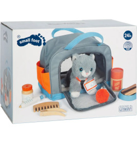 Katze mit Tasche und Pflege-Set