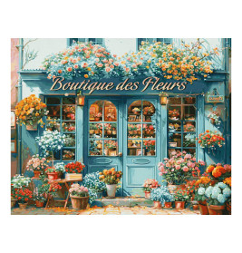 Blaues Blumengeschäft mit bunten Blumen und Pflanzen, die außen sowie am Eingang ausgestellt sind.