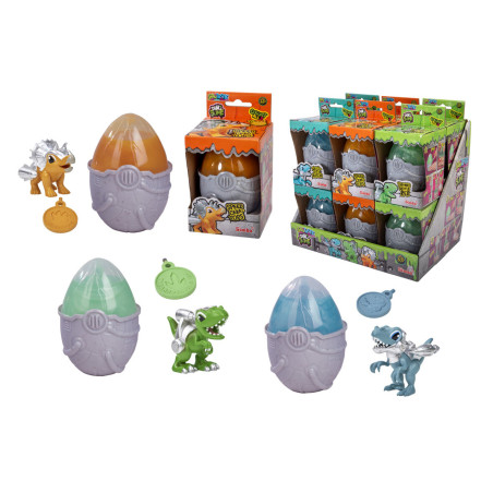 Dinosaurier-Eier mit Überraschungsfiguren und Münzen, teils verpackt, teils zur Ansicht des Inhalts geöffnet.