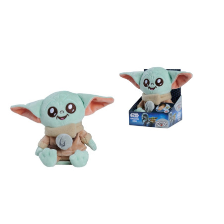 Plüschfigur von Baby Yoda aus Star Wars, sitzend und in ihrer Verpackung präsentiert.