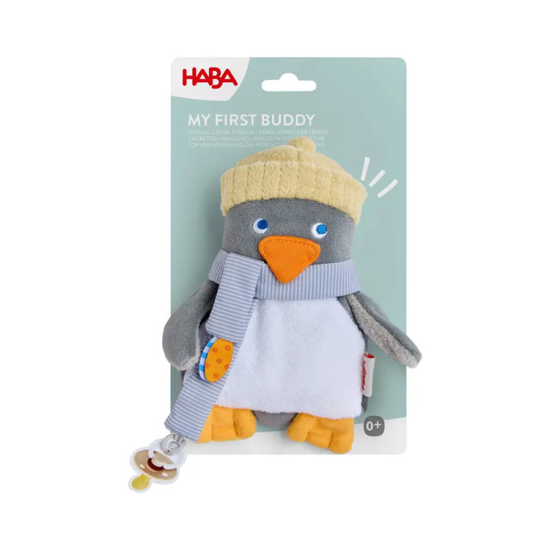 Plüschpinguin mit gelbem Hut und Schal in blauer My First Buddy HABA Verpackung, geeignet ab 0+ Monaten.