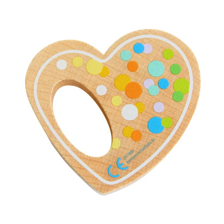 Herzförmiger Holz-Beißring mit bunten Punkten und einem großen ovalen Loch in der Mitte.