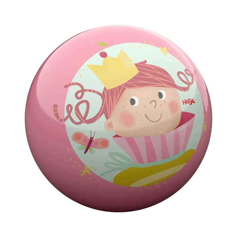 Rosa Ball mit Illustration eines lächelnden Mädchens mit gelber Krone, umgeben von Sternen und einem Schmetterling.