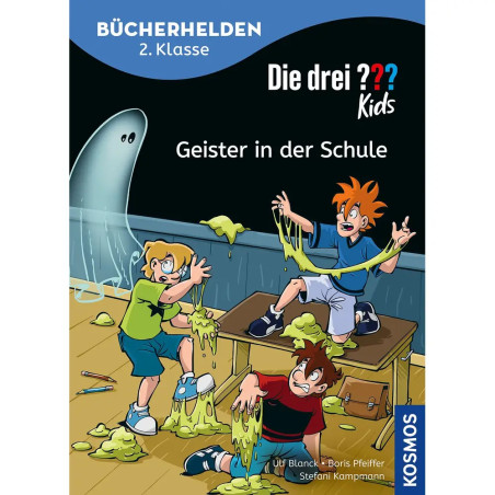 Drei Kinder im Klassenraum erschrecken vor grünem Schleim und einer geisterhaften Gestalt im Hintergrund.