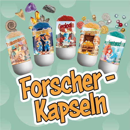 Fünf wissenschaftliche Kapseln und verschiedene Schätze über den fetten Schriftzug "Forscher-Kapseln".