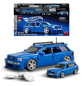 Blaues Hot Wheels Set: 94 Audi Avant RS2 als Modellauto mit Box, Ersatzrädern und kleinem passenden Auto.