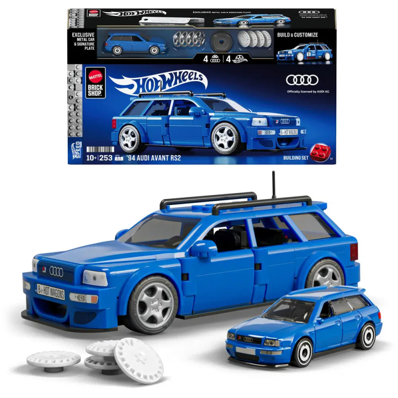 Blaues Hot Wheels Set: 94 Audi Avant RS2 als Modellauto mit Box, Ersatzrädern und kleinem passenden Auto.