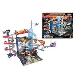 Fast & Furious Garage-Spielset mit Rampen, Strecken und Autos, im Hintergrund ist die Verpackung zu sehen.