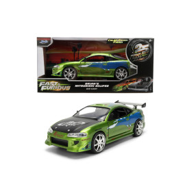 Ein grünes Fast & Furious Mitsubishi Eclipse Spielzeugauto vor seiner Verpackung.