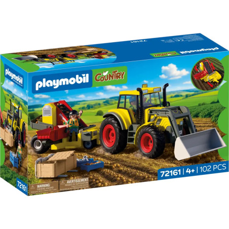 Großer Traktor mit Kartoffelroder