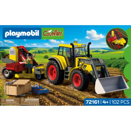 Großer Traktor mit Kartoffelroder