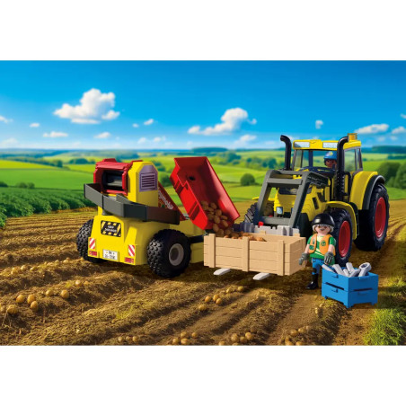 Großer Traktor mit Kartoffelroder