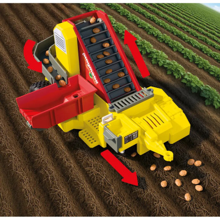 Großer Traktor mit Kartoffelroder