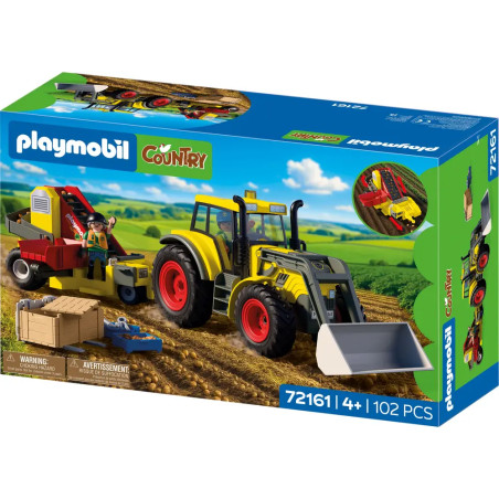 Großer Traktor mit Kartoffelroder