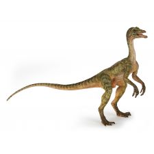 Modell eines zweibeinigen Dinosauriers mit langem Schwanz, grünlicher Haut und scharfen Krallen an Händen und Füßen.