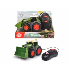 Ferngesteuerter grüner Spielzeugtraktor mit roten Rädern, Frontlader und schwarzer Fernbedienung in Verpackung.