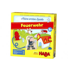 Gelbe HABA-Spielschachtel mit Feuerwehrmann, brennendem Haus, Hydrant und rotem Feuerwehr-Schriftzug.