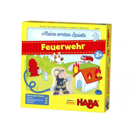 Gelbe HABA-Spielschachtel mit Feuerwehrmann, brennendem Haus, Hydrant und rotem Feuerwehr-Schriftzug. Gelbe HABA-Spielschachtel mit Feuerwehrmann, brennendem Haus, Hydrant und rotem Feuerwehr-Schriftzug.