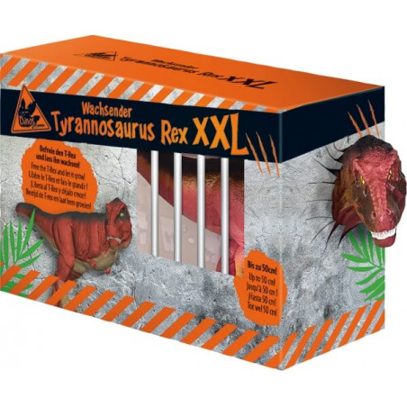 Orange Box mit Aufschrift Wachsende Tyrannosaurus Rex XXL und Dinosaurierspielzeug hinter Gittern sichtbar.