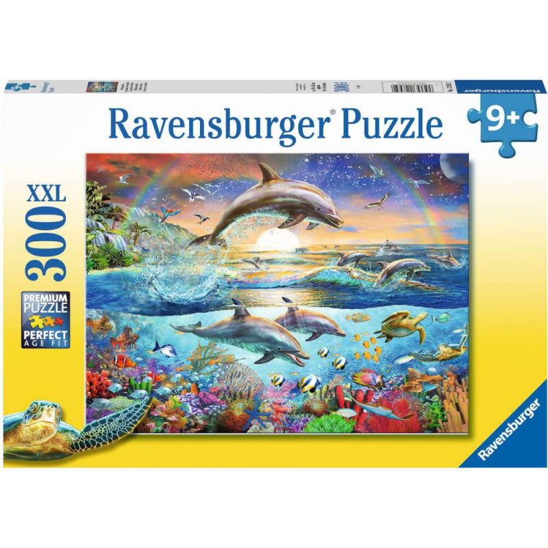 Puzzlebox mit springenden Delfinen, buntem Ozean, Fischen, Schildkröten und Sonnenuntergang. 300 Teile.