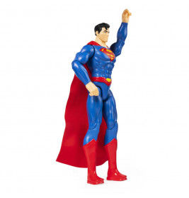 Superman-Actionfigur im blauen Anzug mit rotem Umhang, hebt den Arm, als würde sie fliegen.