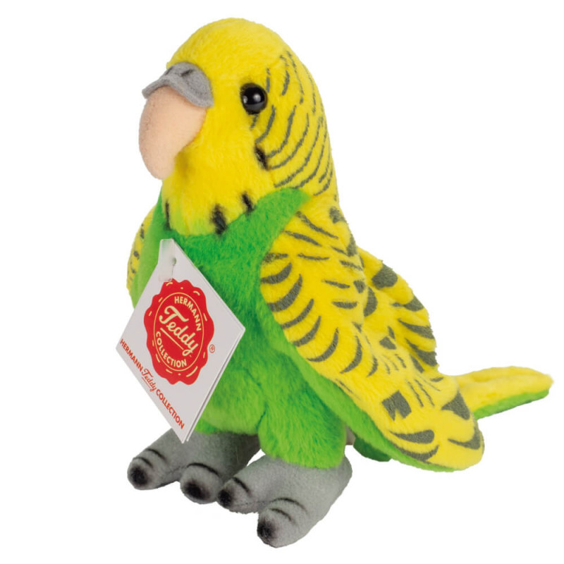 Plüschiger gelb-grüner Wellensittich mit Schild, schwarzen Abzeichen, grauem Schnabel und Füßen.