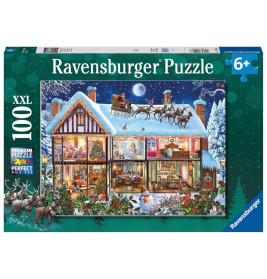 Ravensburger Puzzlebox mit 100 Teilen: Weihnachtsmann und Rentiere fliegen über festlich geschmücktes Haus.