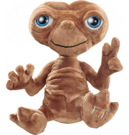 E.T.-Plüschtier sitzt aufrecht und zeigt mit einer Hand zwei Finger zum Peace-Zeichen.